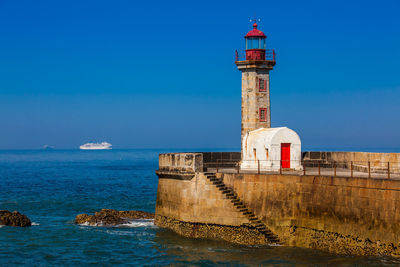 Historical felgueiras lighthouse built on 1886 and located at douro river mouth in porto city