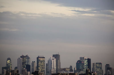 Modern cityscape against sky