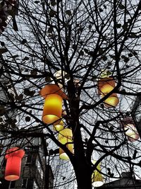 Low angle view of lamp post against sky