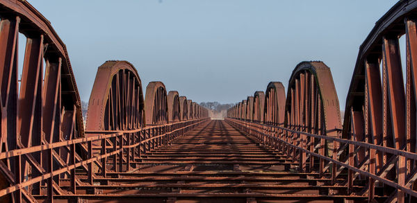 Panoramic shot of railway bridge against clear sky over the river elbe in germany 