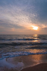 Empty beach with blue sea water and sky scenic landscape wallpaper, summer vacation season concept.