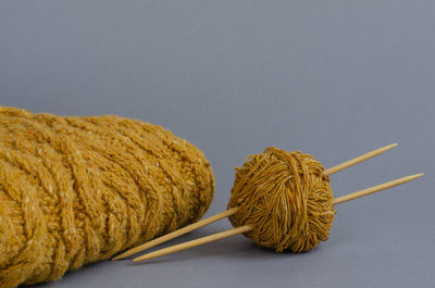 High angle view of stuffed toy on table against gray background