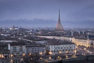 High angle view of city buildings at dusk