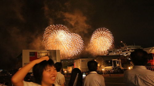 Firework display at night