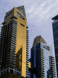 Low angle view of skyscrapers against sky