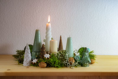 Close-up of christmas decorations on table at home