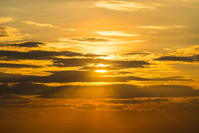 Scenic view of dramatic sky during sunset