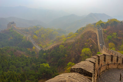 Scenic view of mountain range at the great wall in badaling against sky