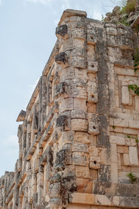 Low angle view of old building against sky