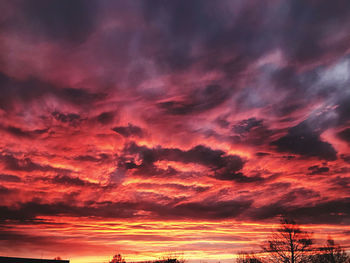 Low angle view of dramatic sky during sunset