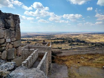 Fort in town against sky