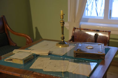 Close-up of books on table at home