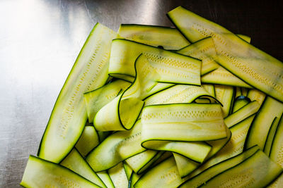 High angle view of sliced zucchini in container