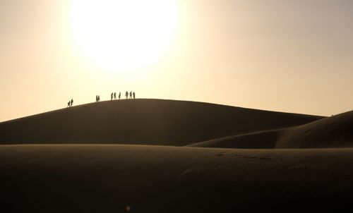 Scenic view of desert against clear sky