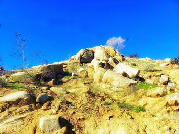 Rock formations against blue sky