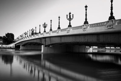 Arch bridge over river