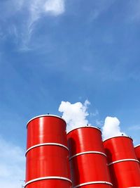 Low angle view of smoke stack against sky