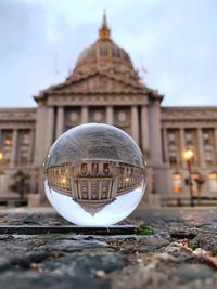 Close-up of building against sky in city