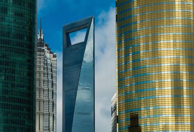 Low angle view of modern buildings against sky