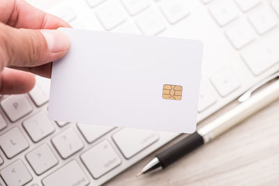 Cropped image of person using mobile phone