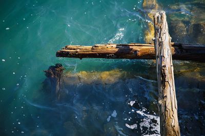 High angle view of abandoned swimming in sea