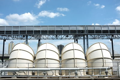 Low angle view of factory against sky