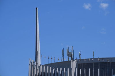 Low angle view of building against blue sky