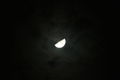 Low angle view of moon against sky at night