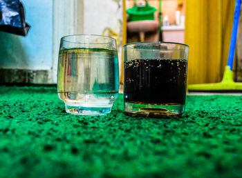 Close-up of glasses on table