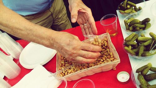 Cropped image of woman eating food