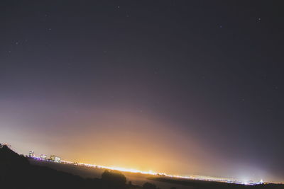 Low angle view of moon in sky at night