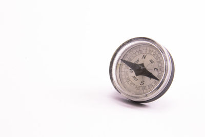 Close-up of clock on white background