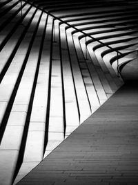 Low section of man walking on steps