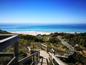 High angle view of beach against clear blue sky