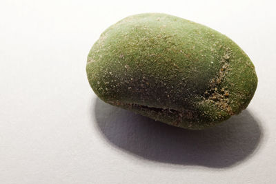 Close-up of apple against white background