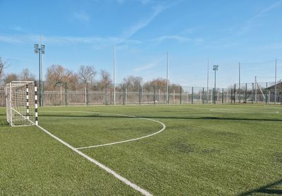 Empty soccer field against sky