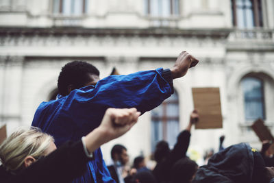 Black lives matter protester raised fist blm