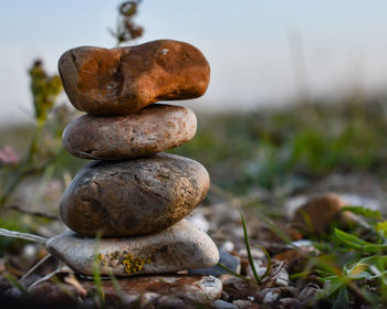 Close-up of stone stack on rock