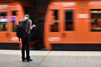 Full length rear view of train at railroad station