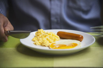 Close-up of breakfast served on table