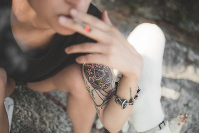 Close-up of woman hand with tattoo