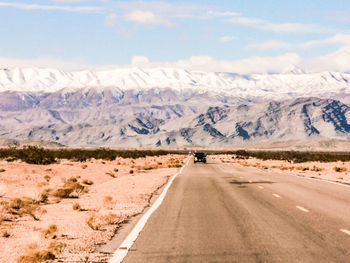 Scenic view of snowcapped mountain against sky