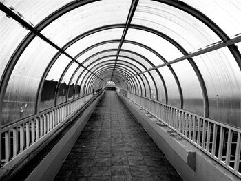 Footbridge against sky