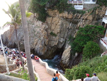 High angle view of people relaxing on mountain