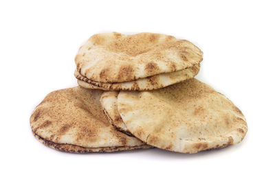 Close-up of cookies against white background