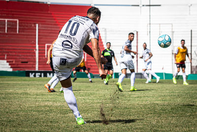 Group of people playing soccer