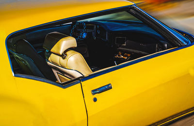 Close-up of yellow car