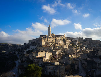 Buildings in city against sky