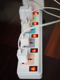 High angle view of electrical outlet on table