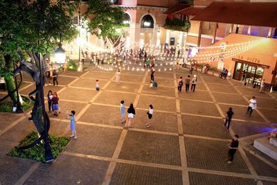 High angle view of people on street in city